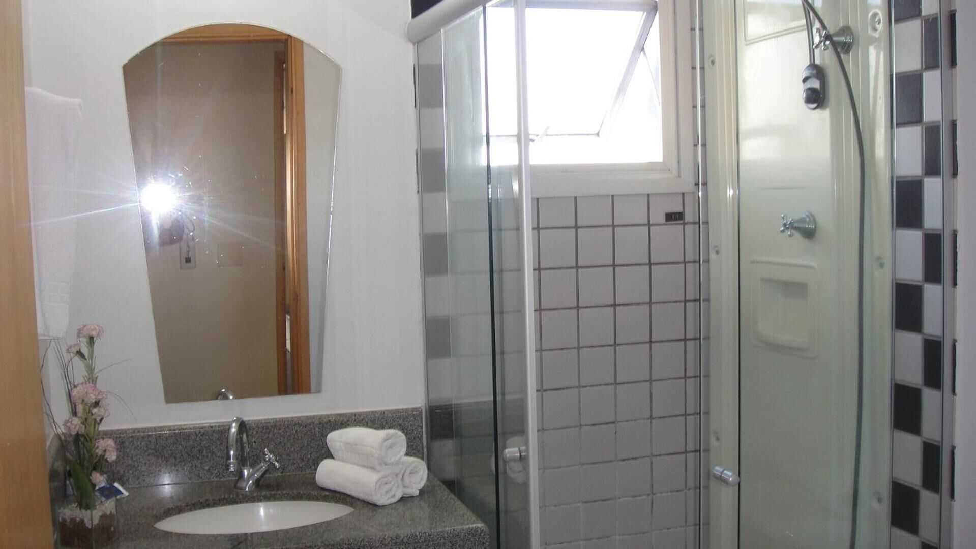 shower, rainfall showerhead, hair dryer, towels