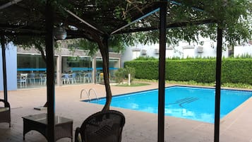 Outdoor pool, pool umbrellas, pool loungers