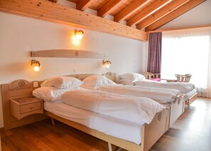 Triple Room, Balcony | Down comforters, in-room safe, soundproofing, iron/ironing board - Hotel Artemis (Saas-Fee)