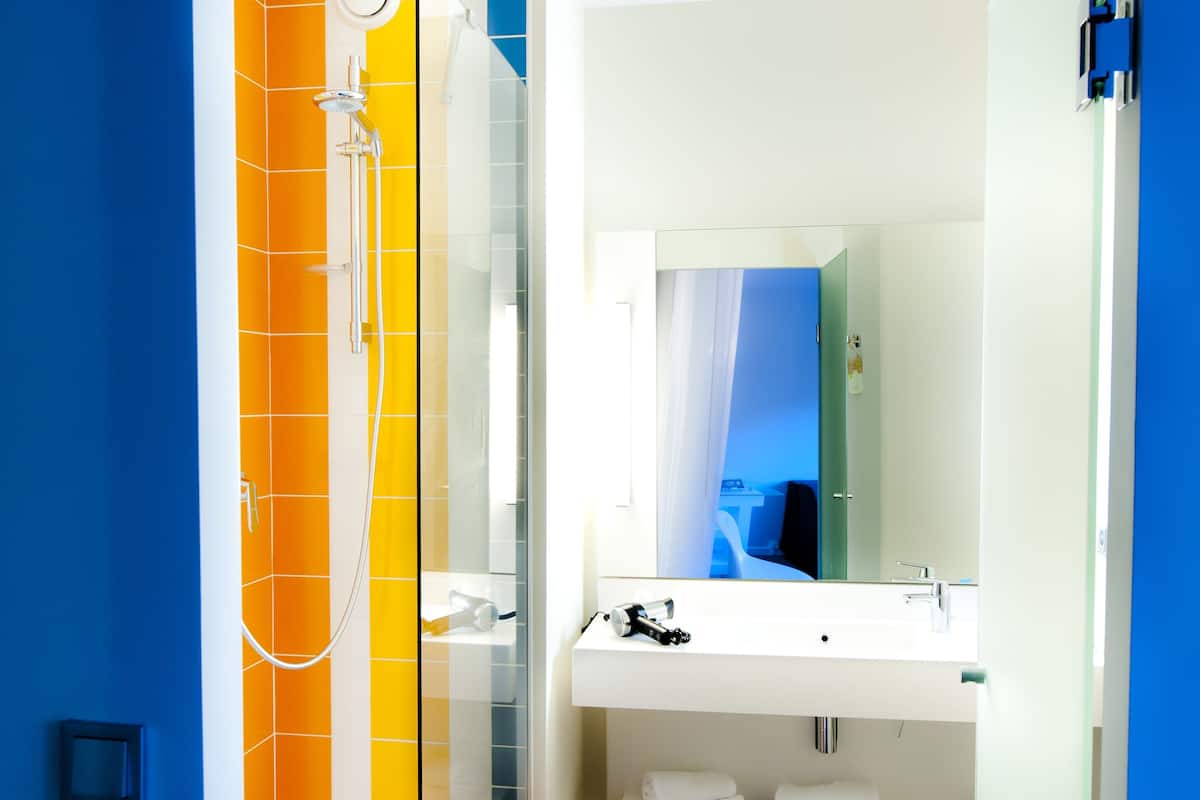 eco-friendly toiletries, hair dryer, towels, soap