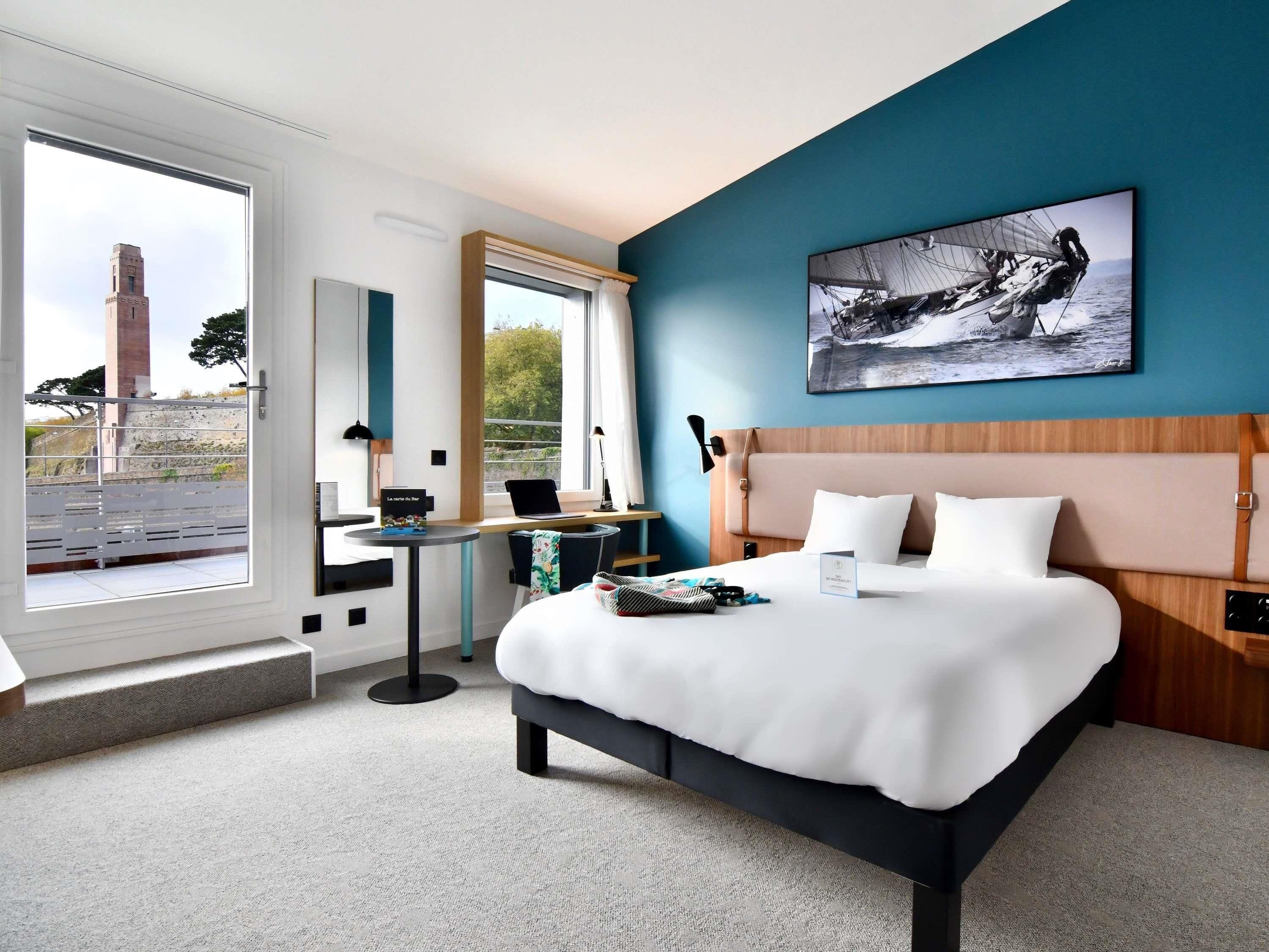 Deluxe kamer, 1 tweepersoonsbed, balkon | Een bureau, verduisterende gordijnen, geluiddichte muren