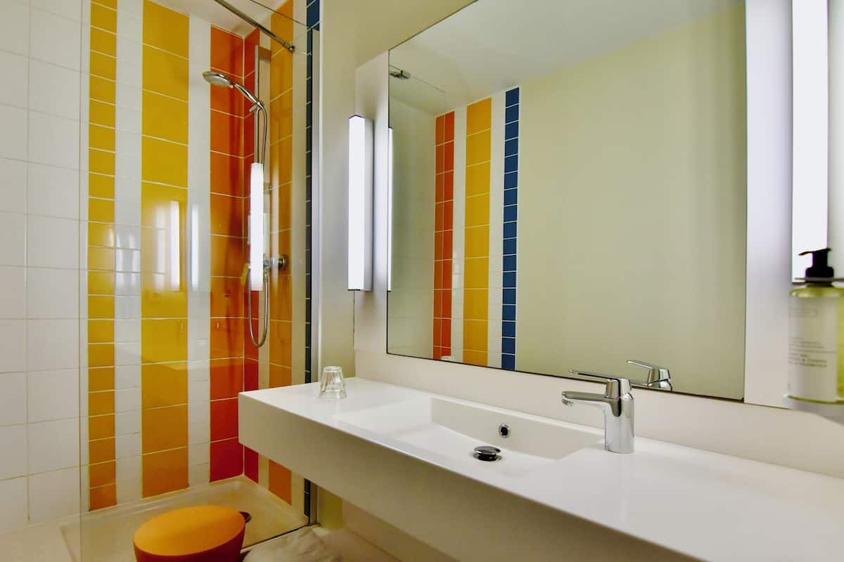 Junior Suite, Multiple Beds | Bathroom | Eco-friendly toiletries, hair dryer, towels, soap