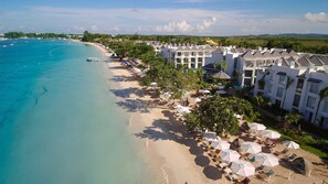 On the beach, white sand, beach umbrellas, beach towels - Azul Beach Resort Negril, Gourmet All Inclusive by Karisma (Negril)