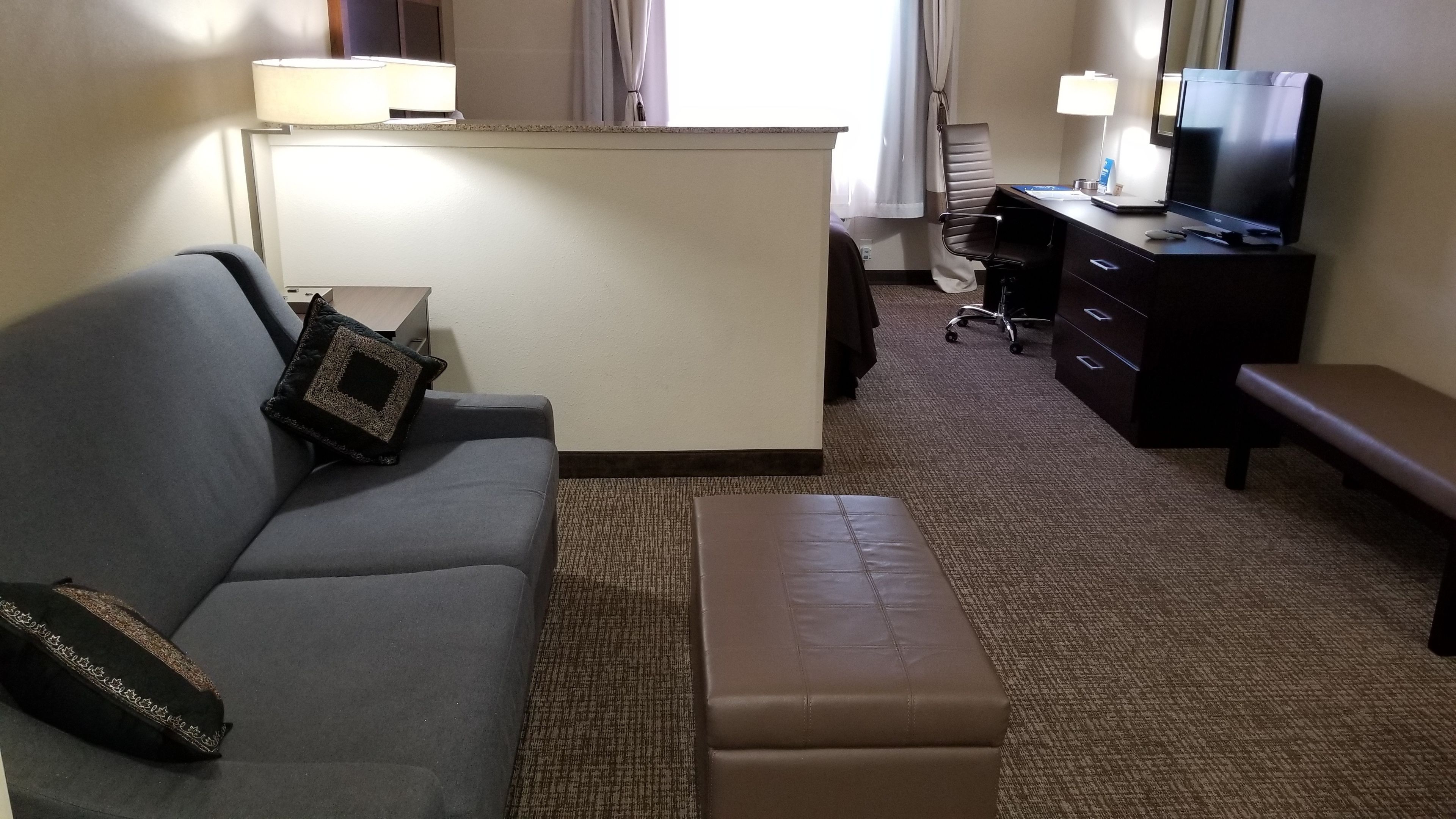 suite, 1 king bed with sofa bed, non smoking | living area | 40-inch flat-screen tv with satellite channels, led tv, computer