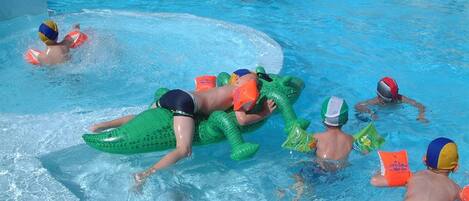 Seasonal outdoor pool, pool umbrellas, pool loungers