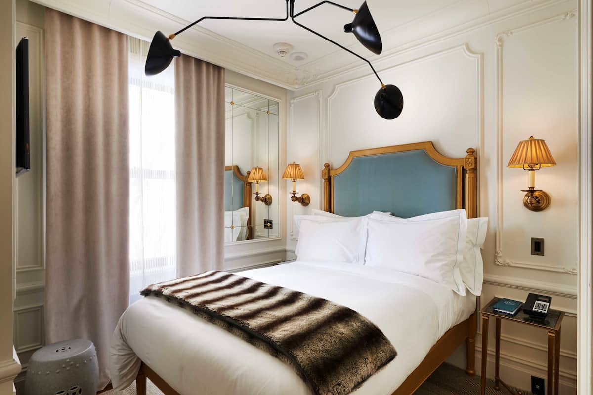 Hypo-allergenic bedding, down comforters, minibar, in-room safe