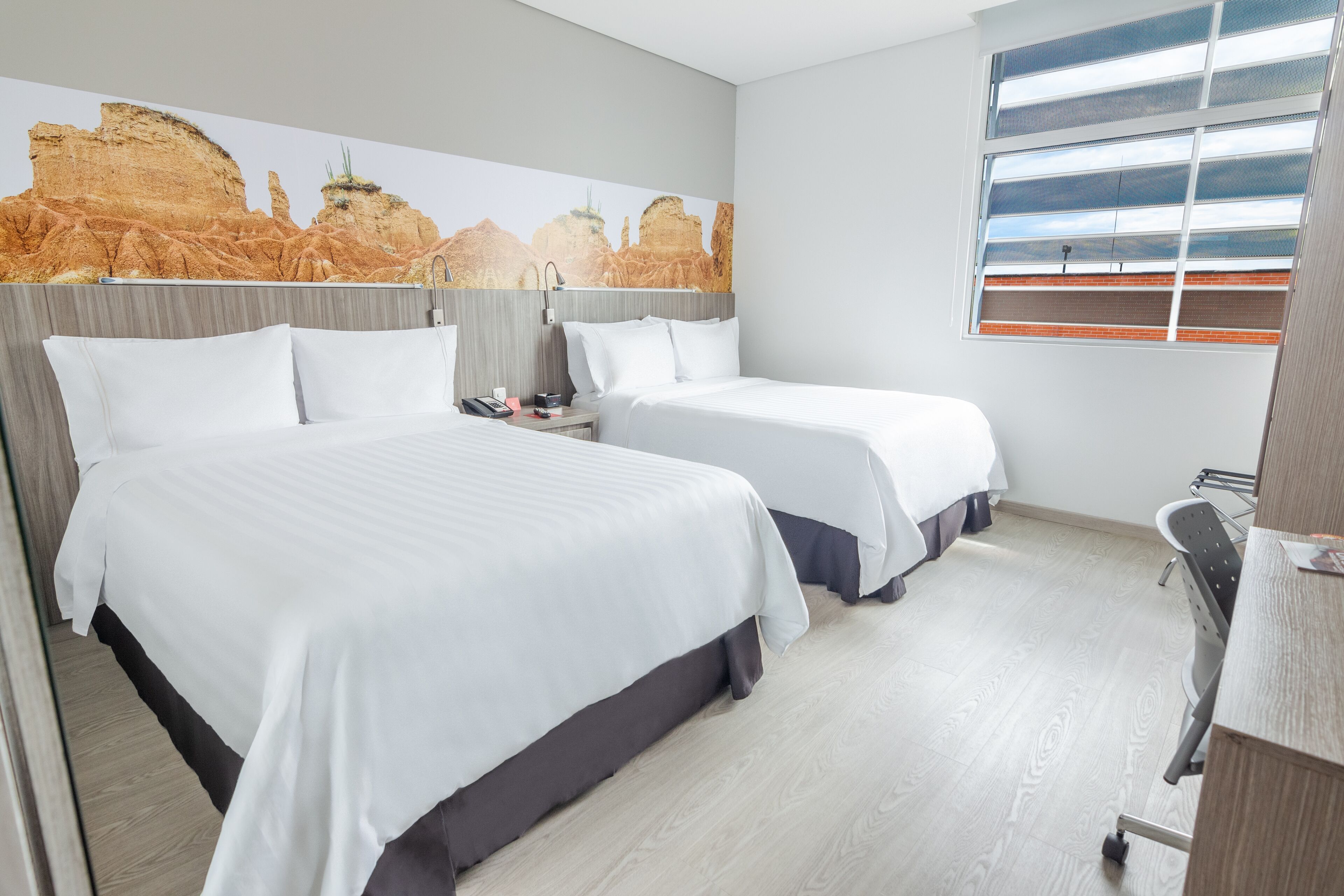 standard twin room, 2 double beds | premium bedding, in-room safe, desk, laptop workspace