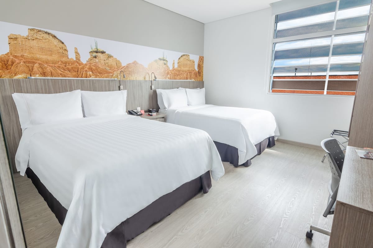 standard twin room, 2 double beds | premium bedding, in-room safe, desk, laptop workspace