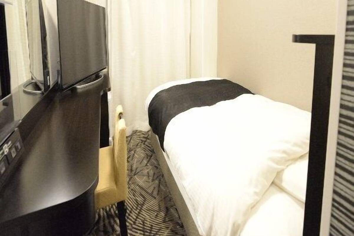 Escrivaninha, cortinas blackout, Wi-Fi de cortesia, roupa de cama