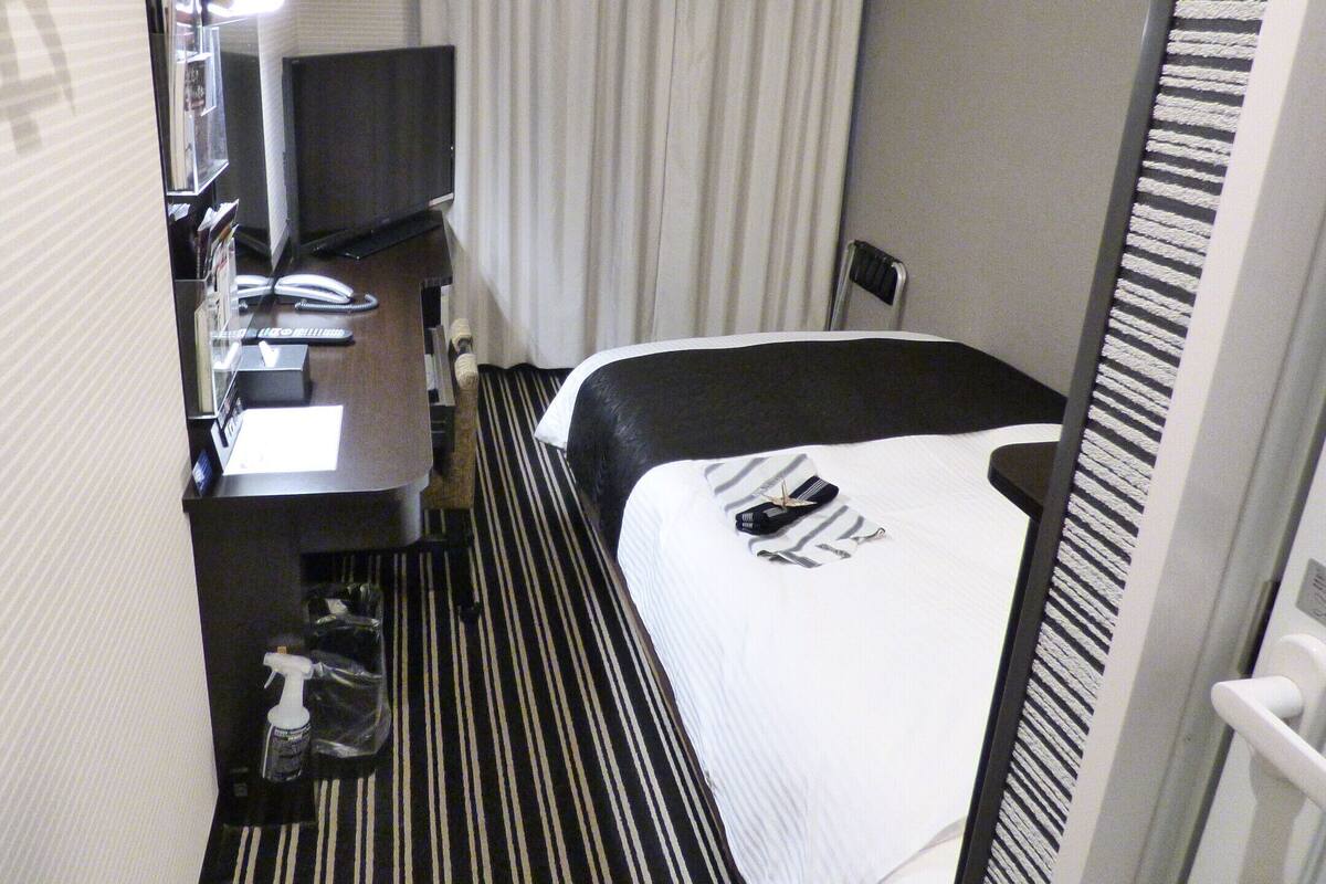 Desk, blackout curtains, free WiFi, bed sheets