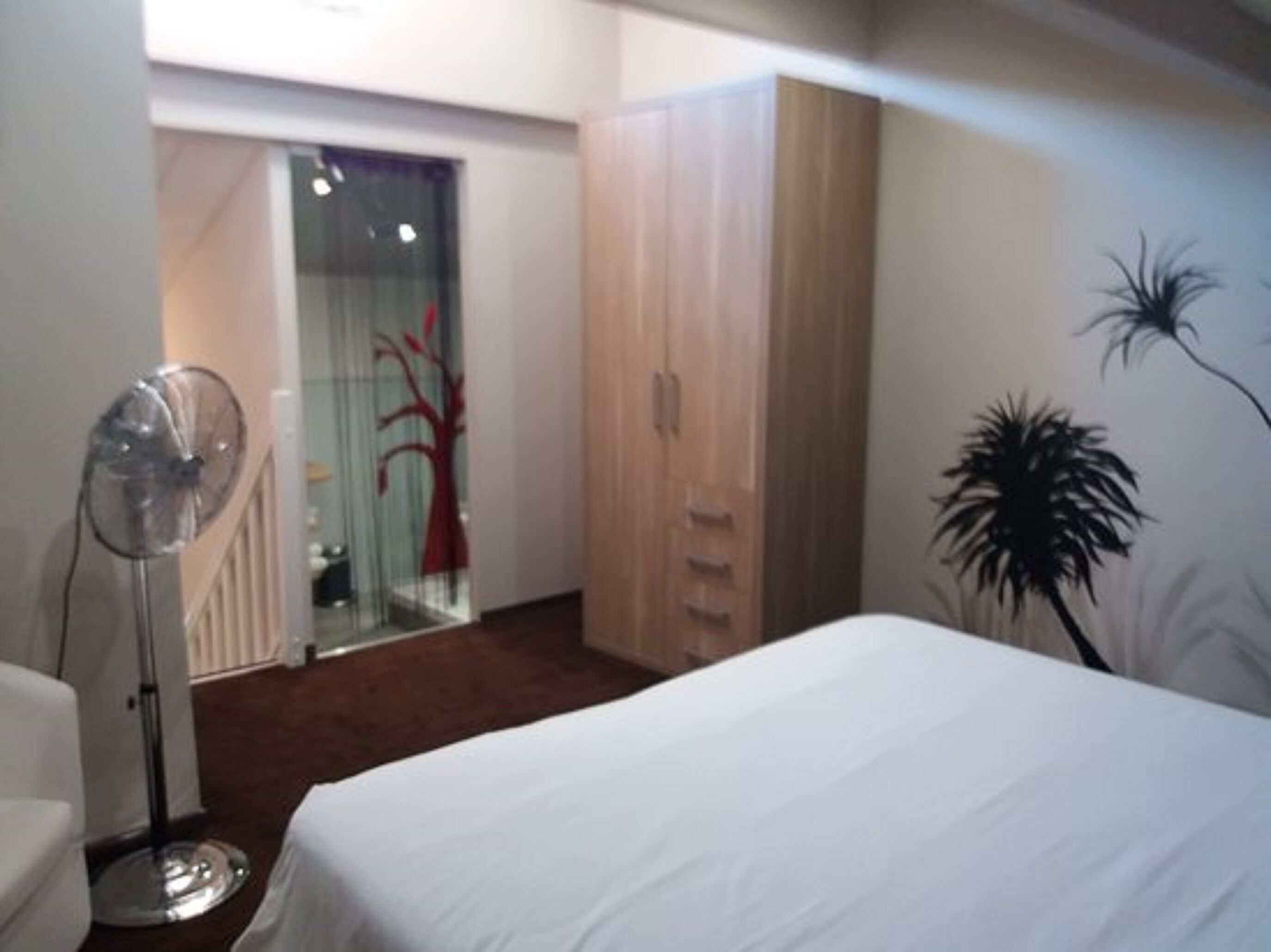 family room | minibar, in-room safe, desk, free cots/infant beds