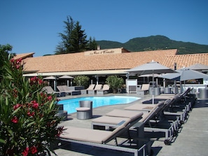 Outdoor pool, pool umbrellas, sun loungers