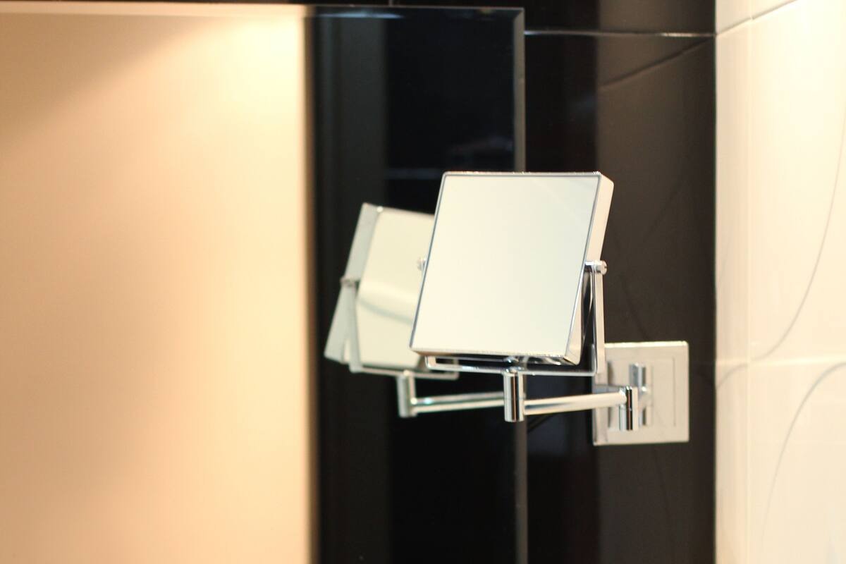 rainfall showerhead, designer toiletries, hair dryer, bathrobes