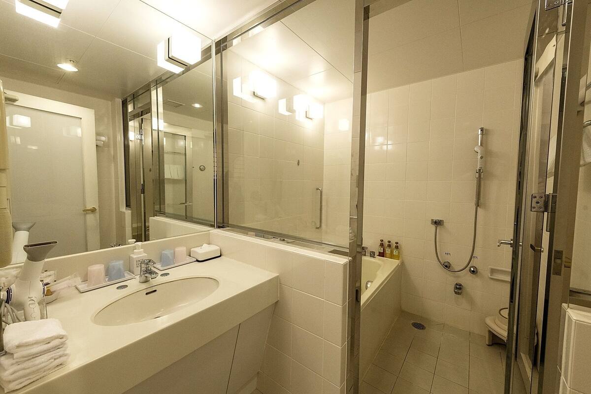 twin room with tatami area main tower, non smoking | bathroom | shower, free toiletries, hair dryer, bathrobes