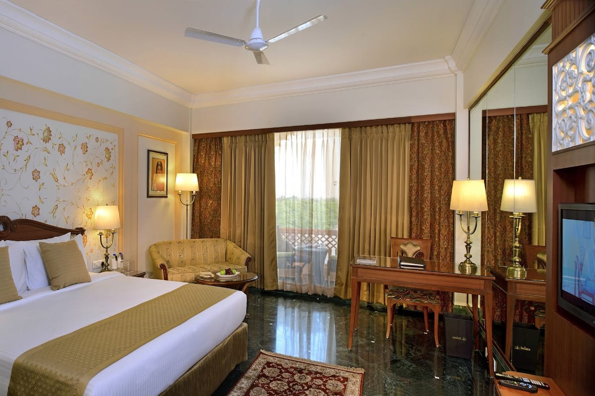 Premium Room with Private Balcony | Minibar, in-room safe, individually decorated, individually furnished