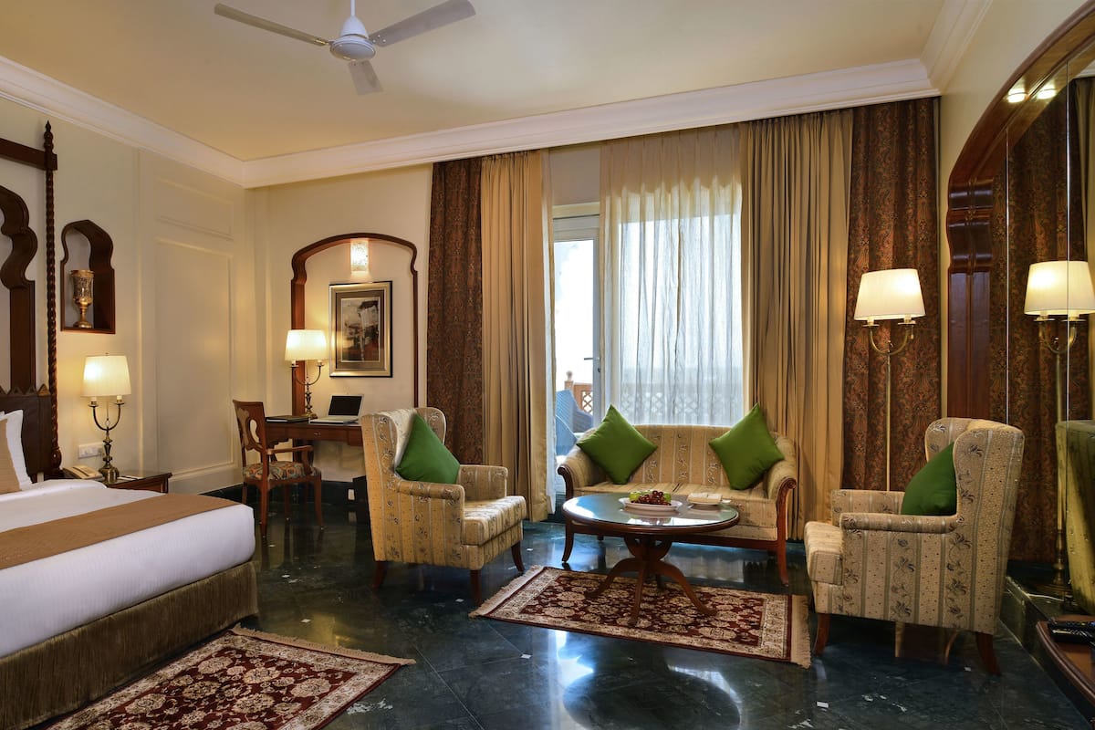 Junior Suite with Private Balcony | Minibar, in-room safe, individually decorated, individually furnished