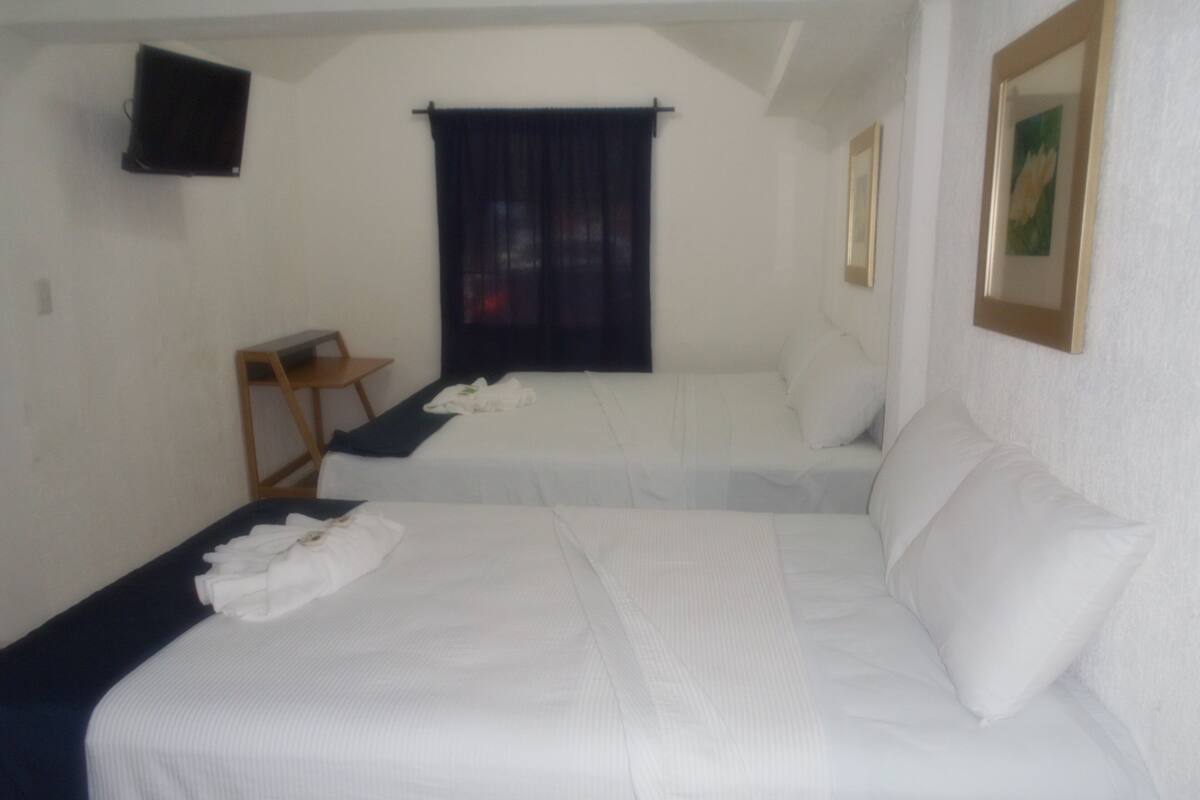 Classic Quadruple Room | In-room safe, iron/ironing board, WiFi (free), bed sheets