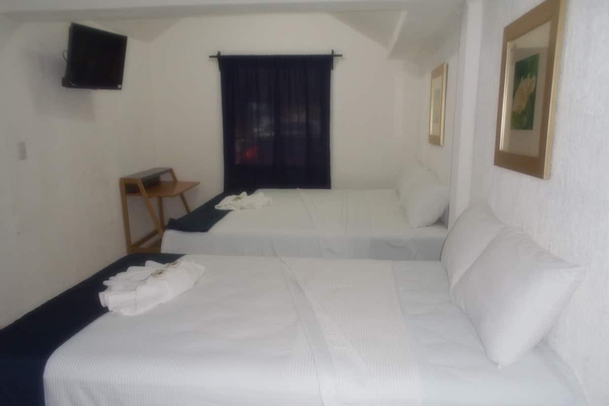 Classic Quadruple Room | In-room safe, iron/ironing board, free WiFi, bed sheets