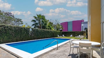 Outdoor pool, open 8:00 AM to 8:00 PM, sun loungers