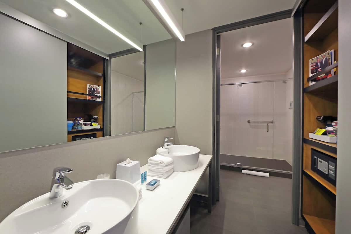 aloft, suite, 2 queen beds, city view | bathroom | shower, hydromassage showerhead, designer toiletries, hair dryer