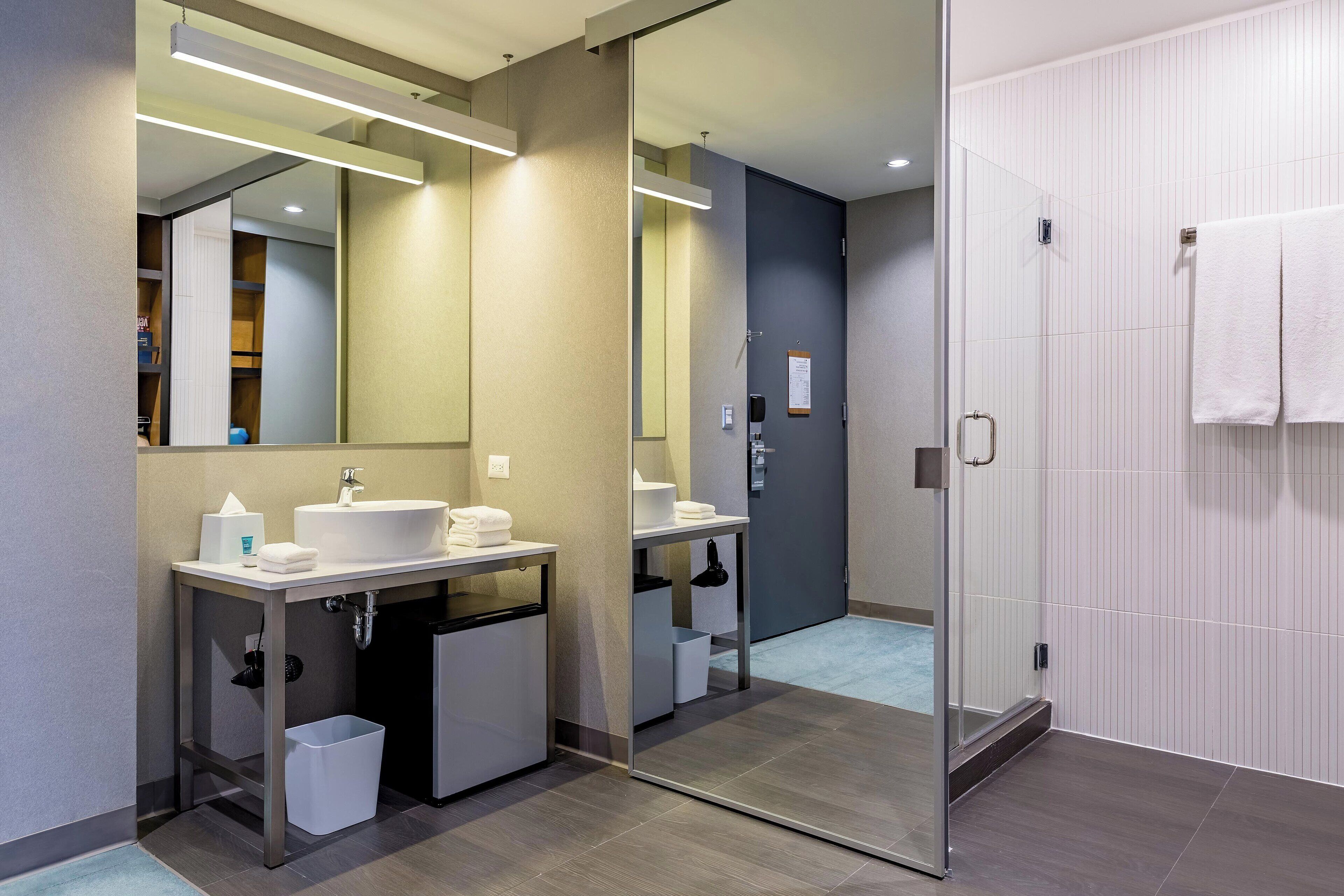 shower, hydromassage showerhead, designer toiletries, hair dryer