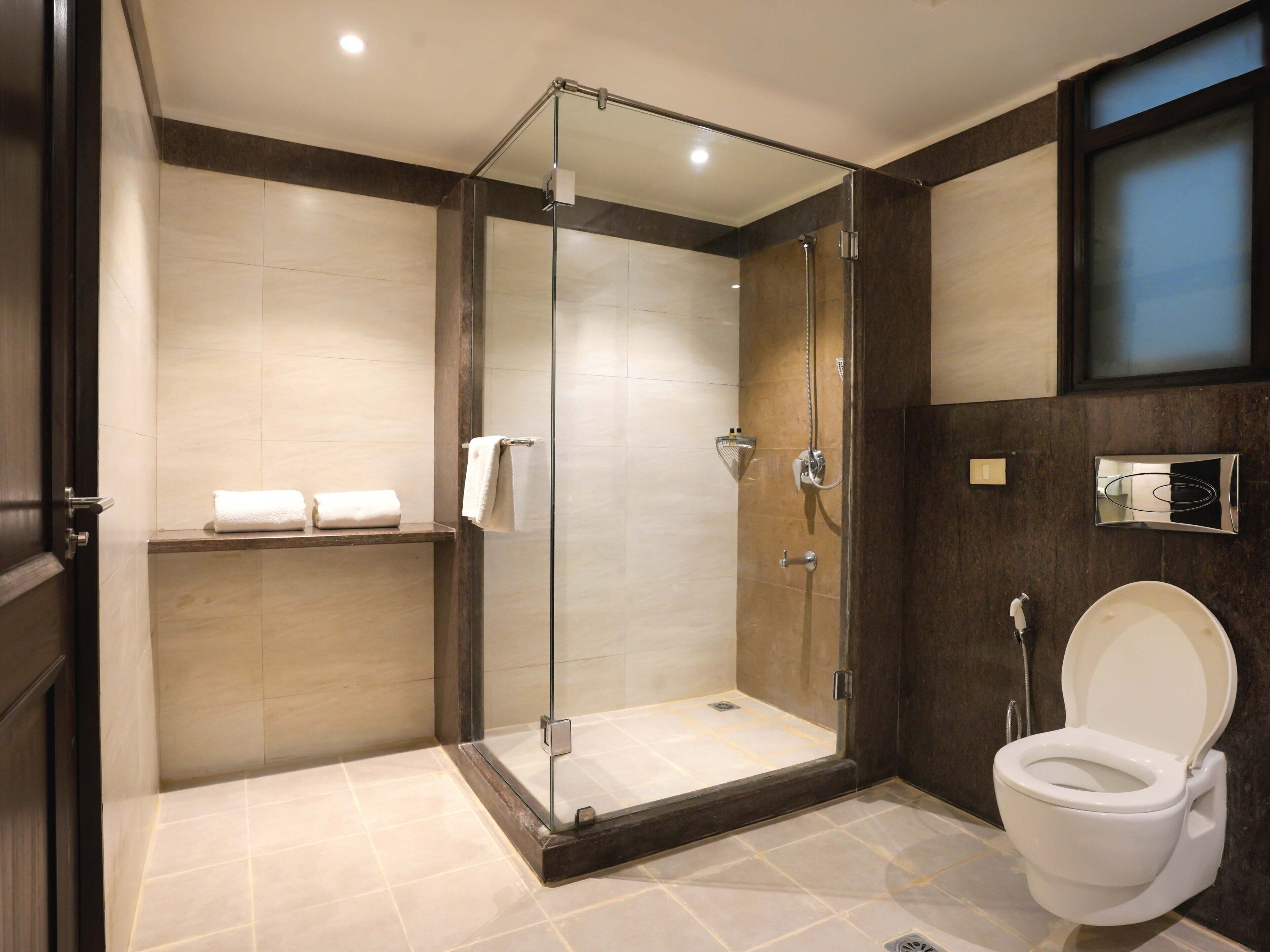 shower, free toiletries, hair dryer, towels