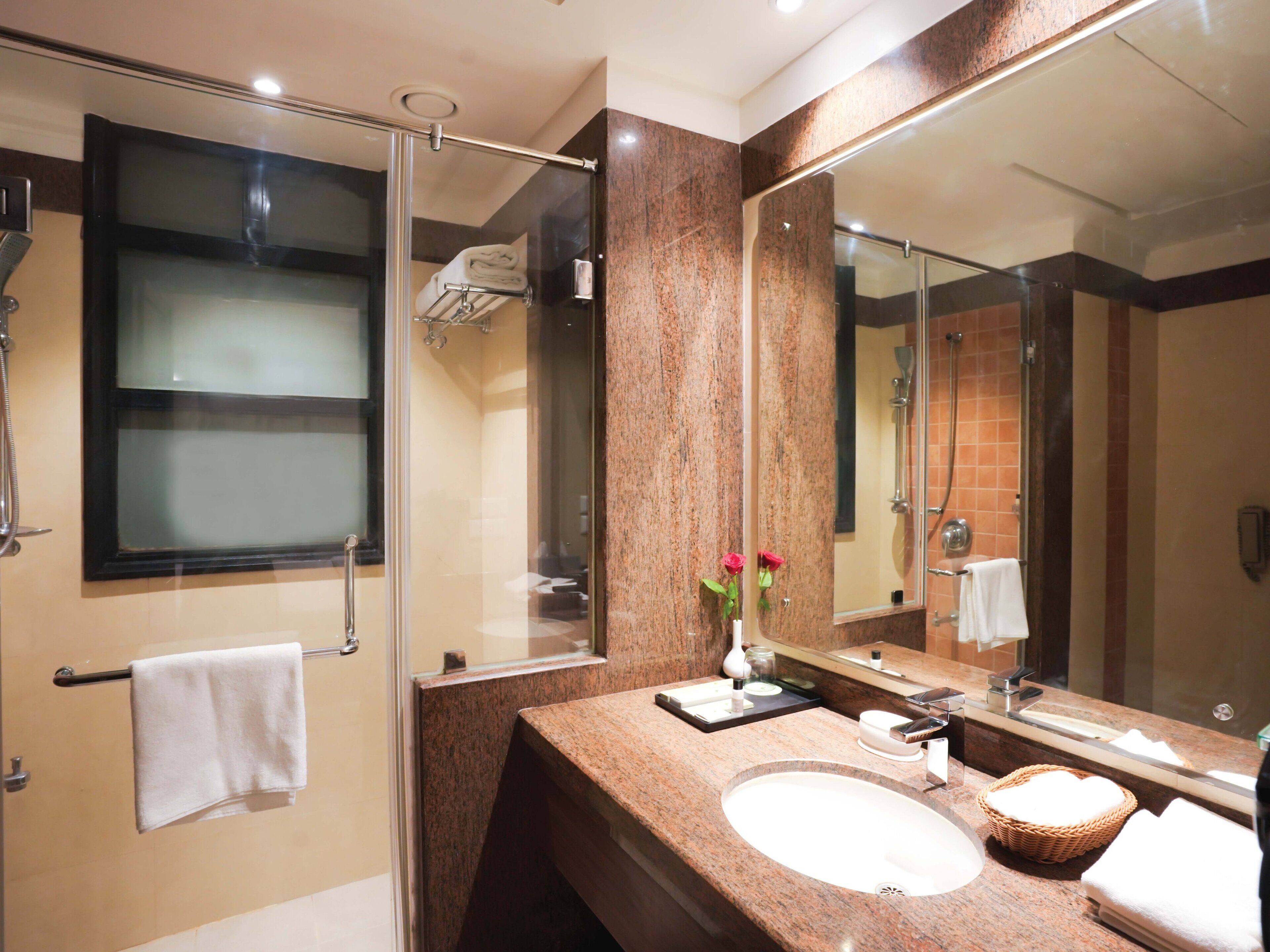 shower, free toiletries, hair dryer, towels