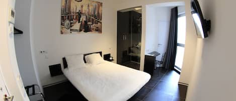 Habitació individual empresarial | Minibar, caixa forta a l'habitació i escriptori