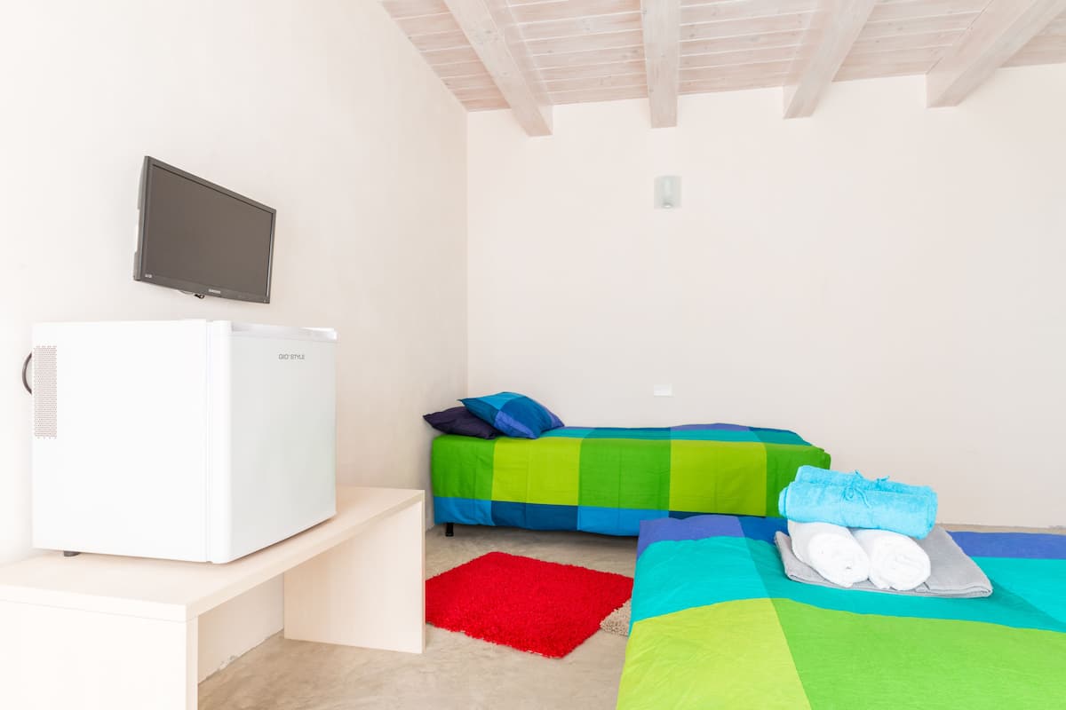 Habitación triple | Sábanas de algodón egipcio, ropa de cama de alta calidad y edredón