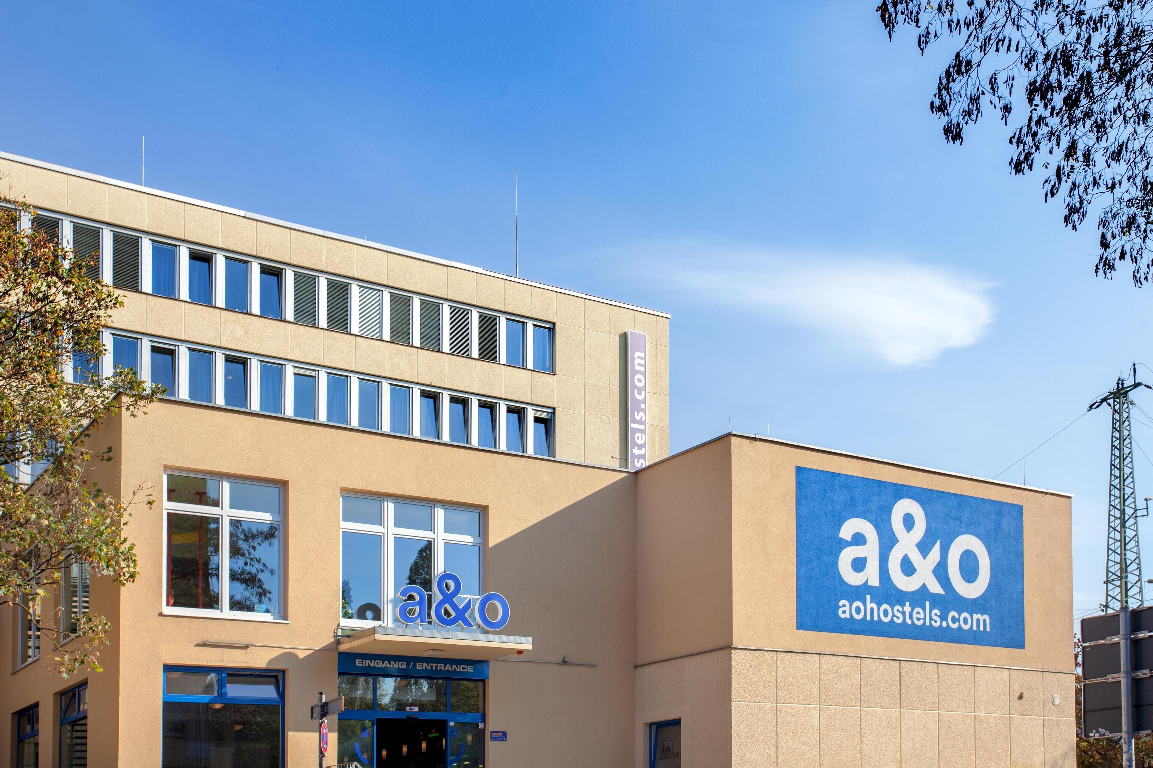 A building with a sign reading "a&o" and "aohostels.com".