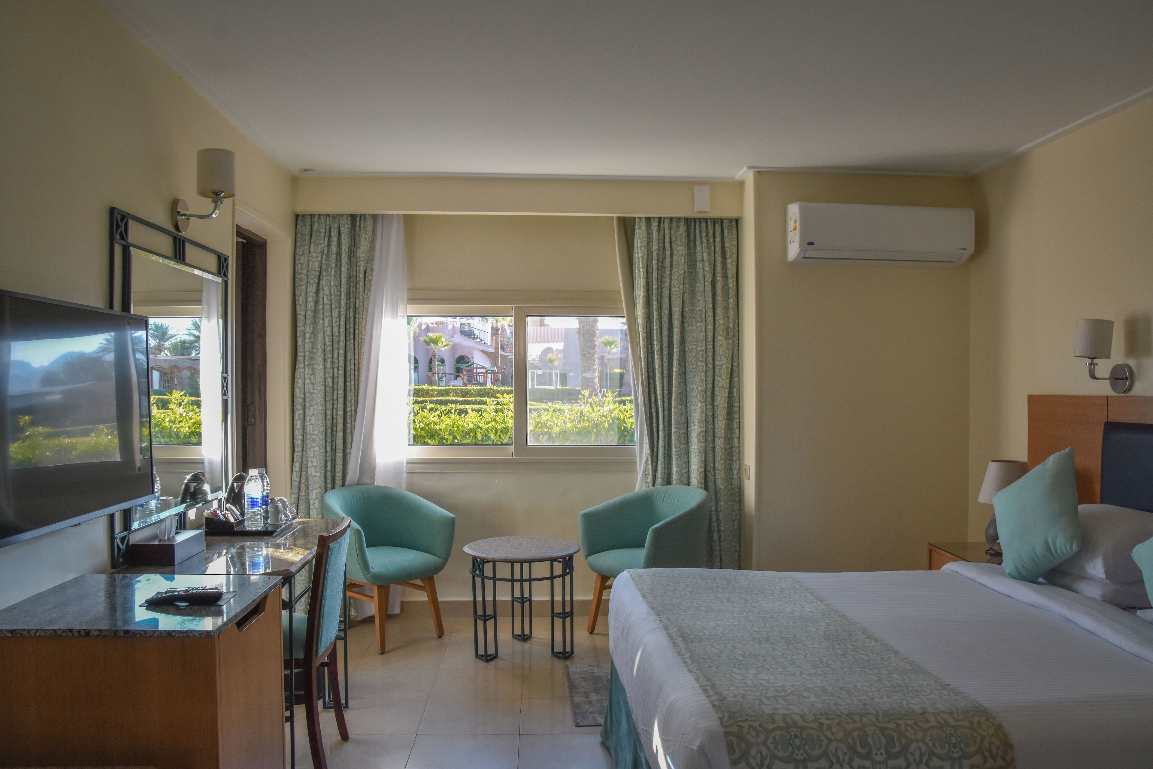 Hypo-allergenic bedding, down duvets, Select Comfort beds, minibar