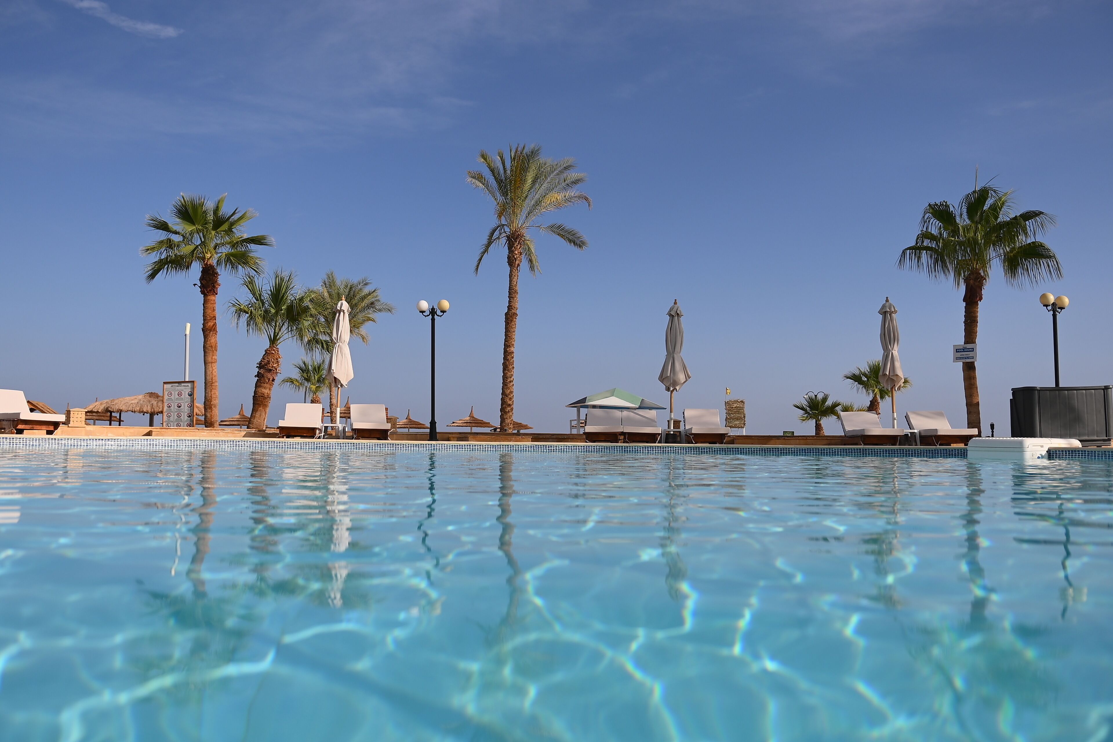 Private beach, beach umbrellas, beach towels, beach volleyball