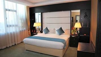 Premium bedding, down duvets, minibar, in-room safe