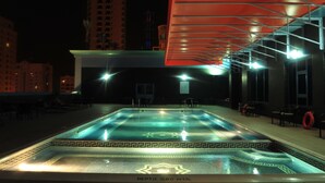 Outdoor pool, sun loungers - The Olive Hotel (Manama)