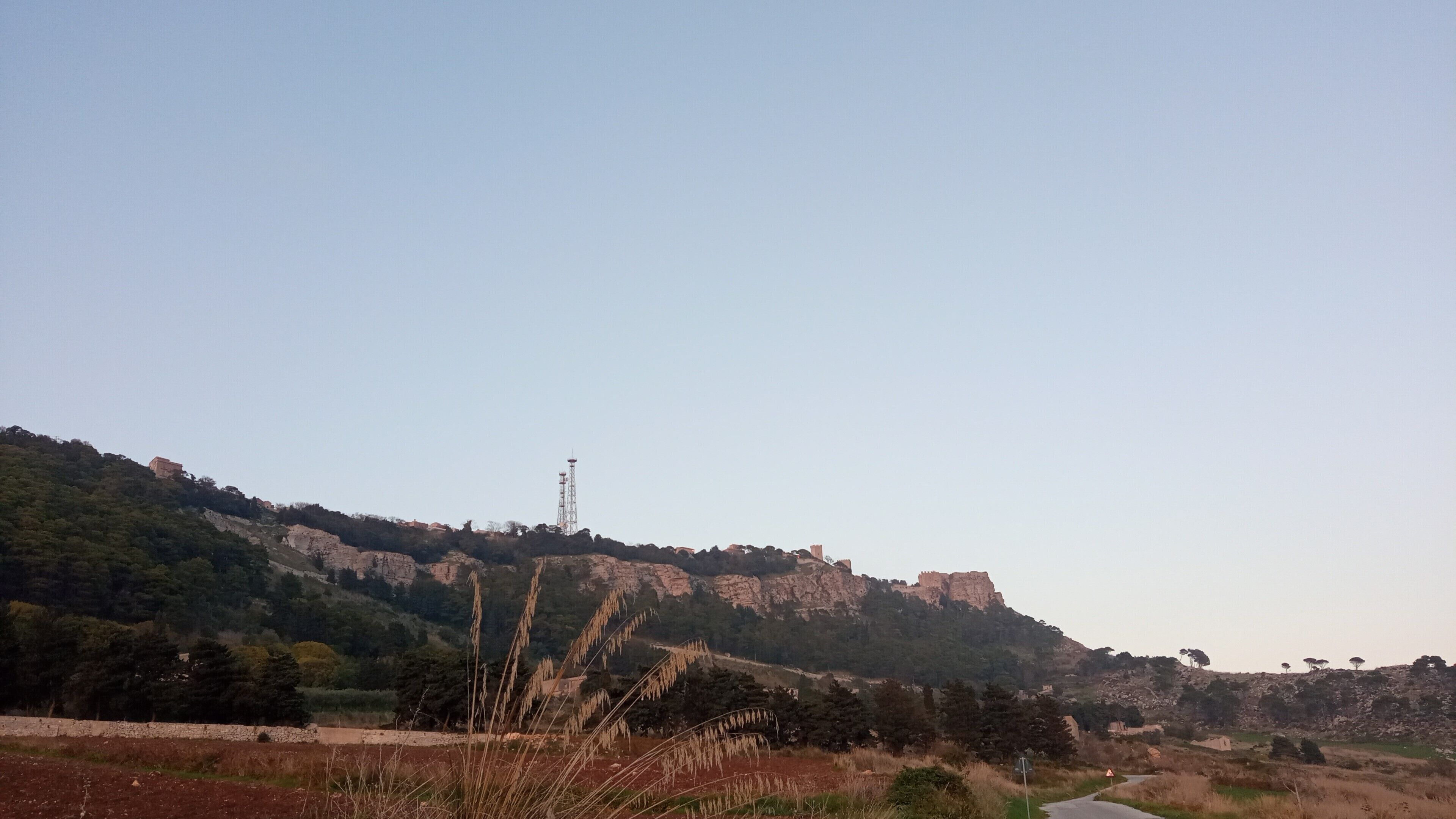 A mountainous landscape with a clear sky.