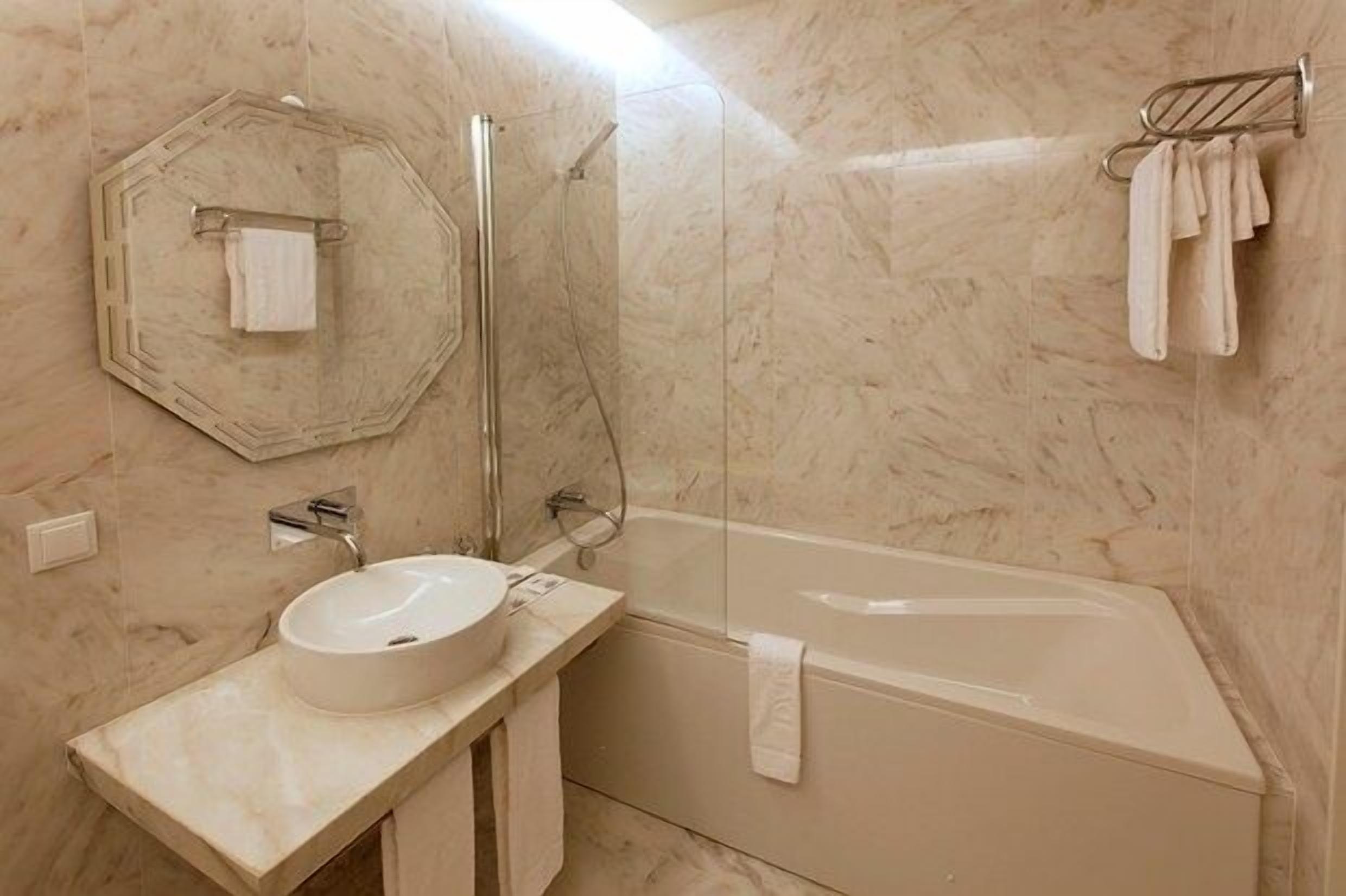 superior double or twin room | bathroom | designer toiletries, hair dryer, bathrobes, slippers