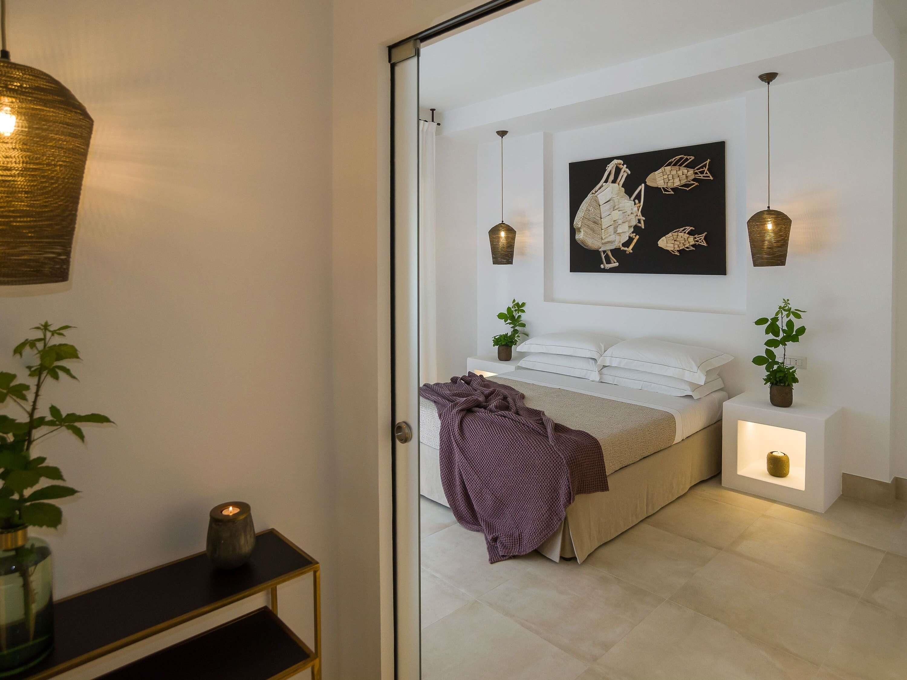 Suíte família, 1 cama King, vista para o jardim | Frigobar, cofres nos quartos, escrivaninha, quartos à prova de som