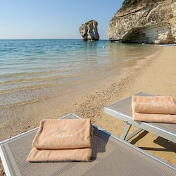 On the beach, sun-loungers, beach umbrellas, 2 beach bars