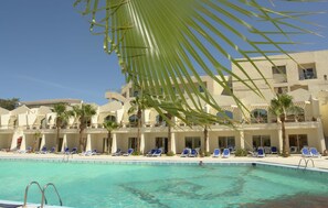 Outdoor pool, pool umbrellas, pool loungers