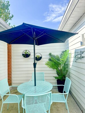 Family Suite, 2 Bedrooms, Kitchenette, Courtyard View | Terrace/patio