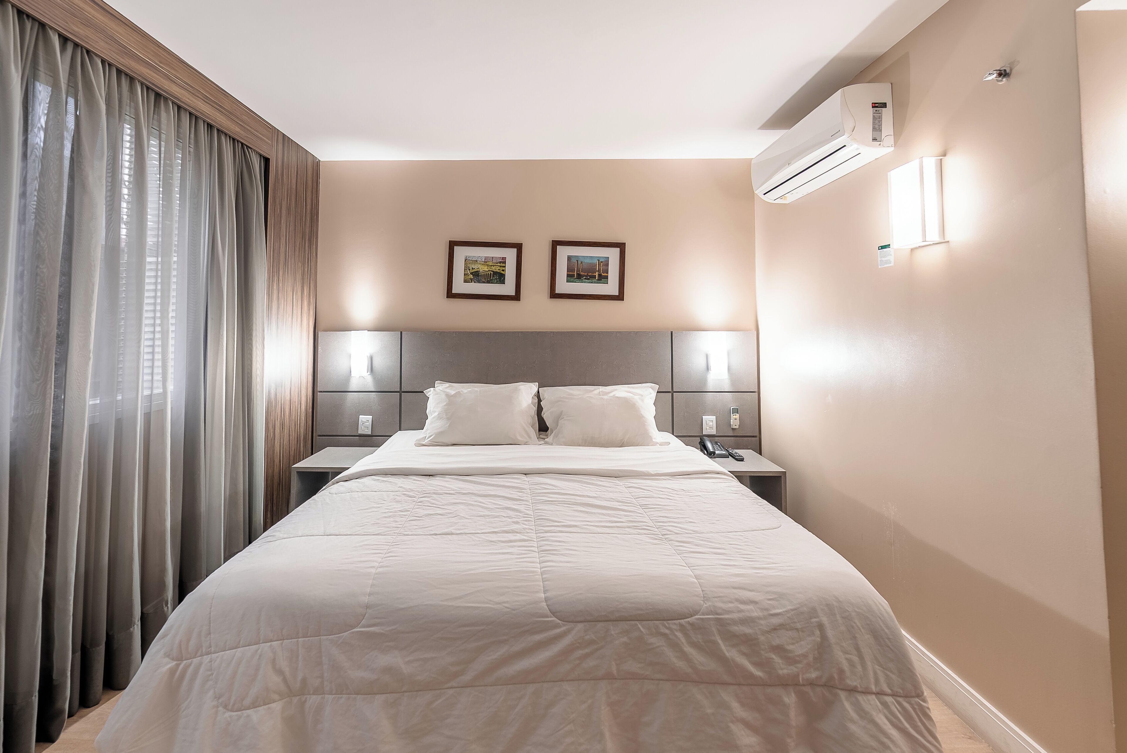deluxe double room | in-room safe, desk, laptop workspace, blackout curtains