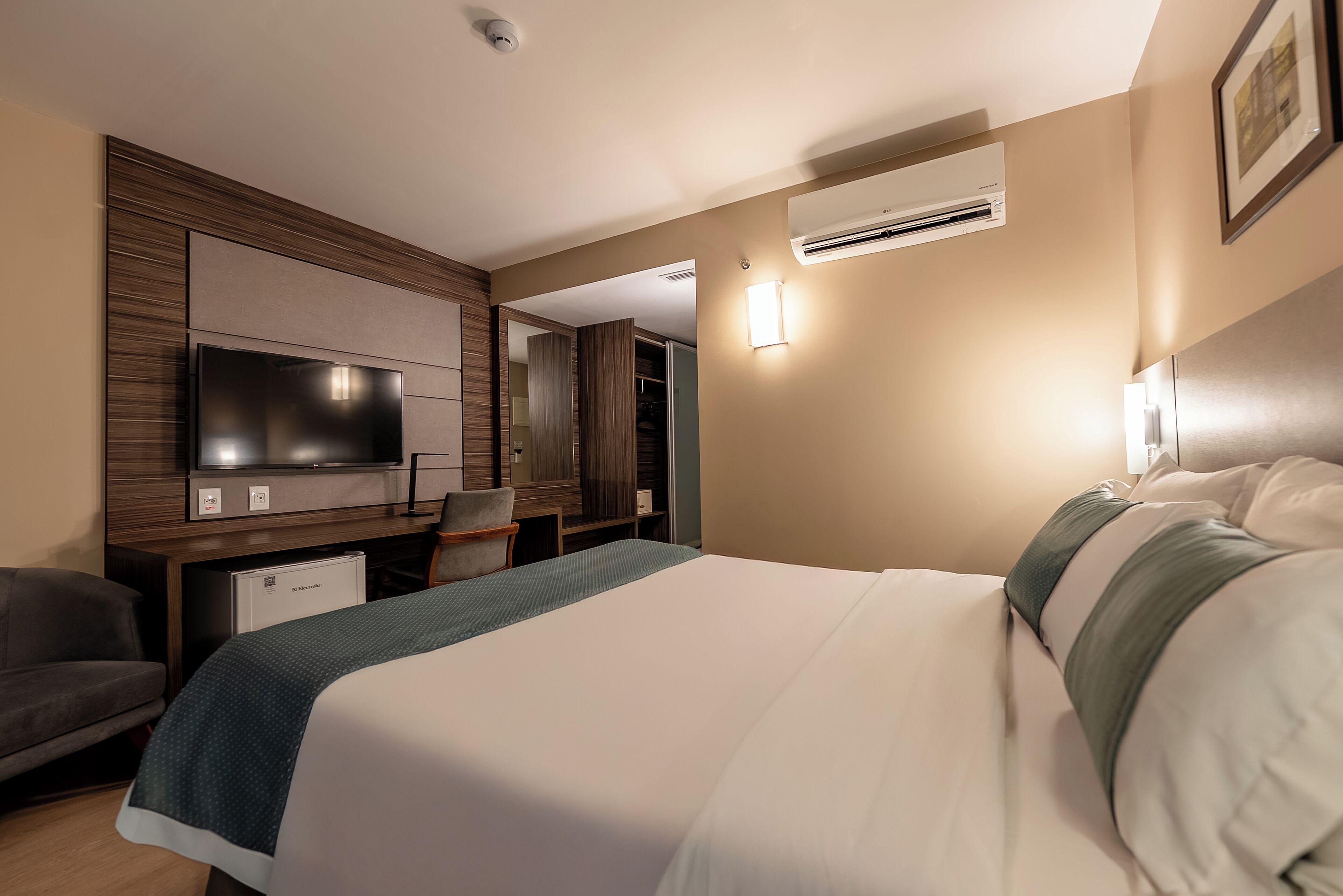 superior double room | in-room safe, desk, laptop workspace, blackout curtains