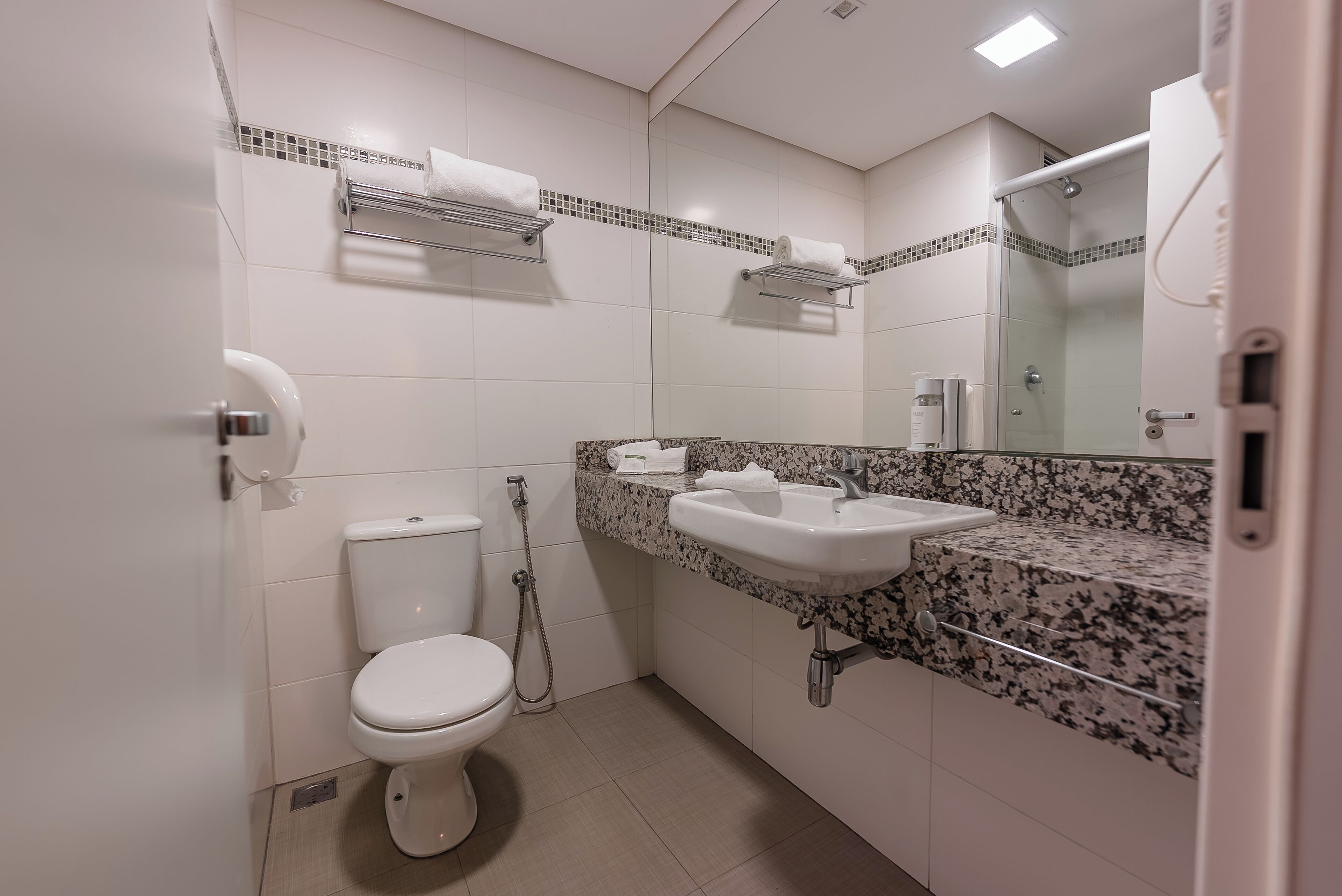 superior double room | bathroom | shower, hair dryer, towels, soap