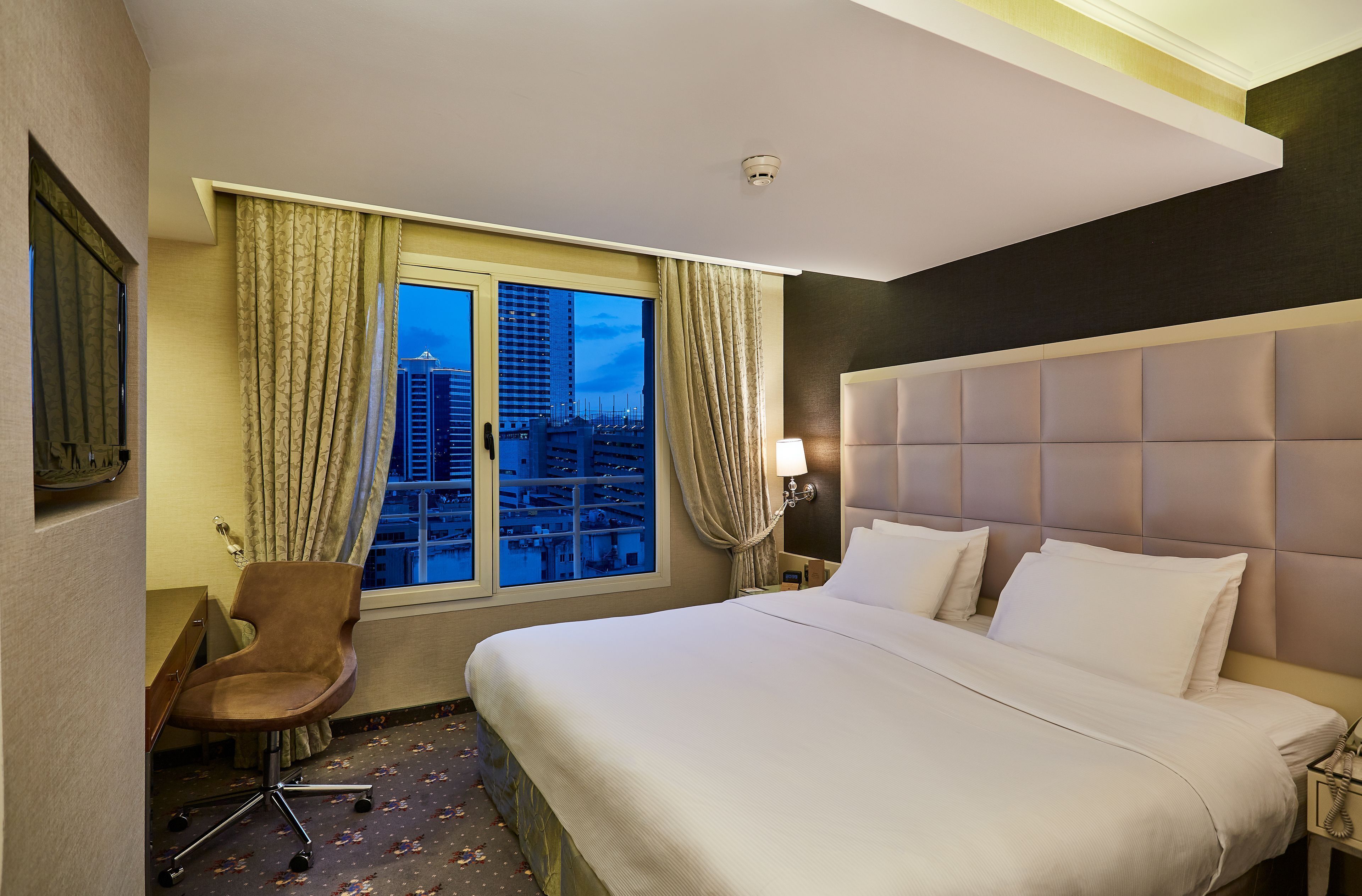 Ropa de cama de alta calidad y minibar 