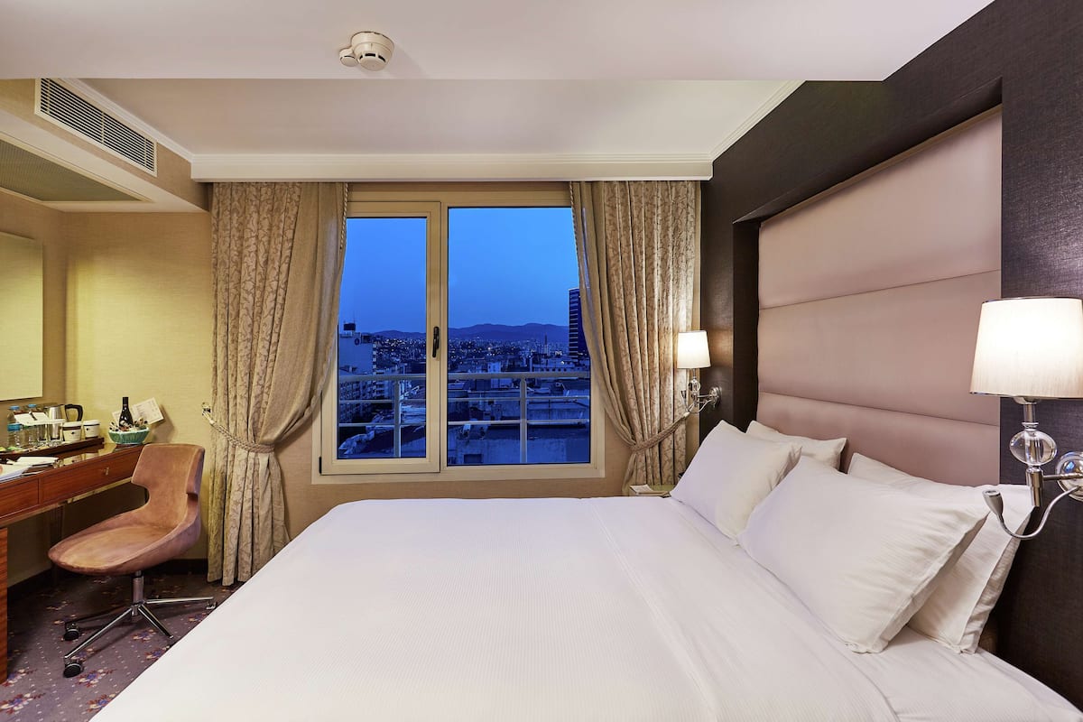 Habitación, 1 cama matrimonial | Ropa de cama de alta calidad y minibar