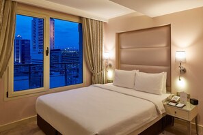 Ropa de cama de alta calidad y minibar