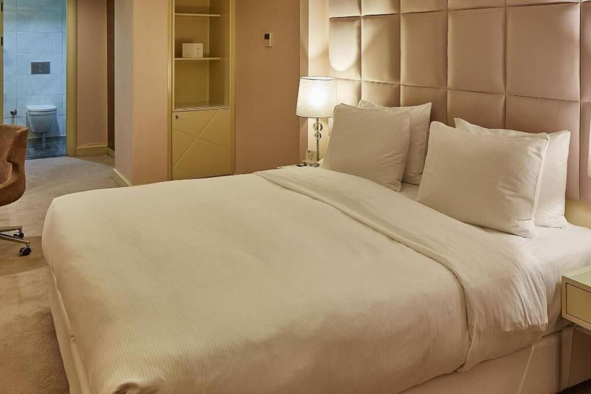 Ropa de cama de alta calidad y minibar