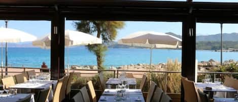 Lunch, dinner served; Mediterranean cuisine, pool views