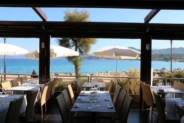 Lunch, dinner served; Mediterranean cuisine, pool views