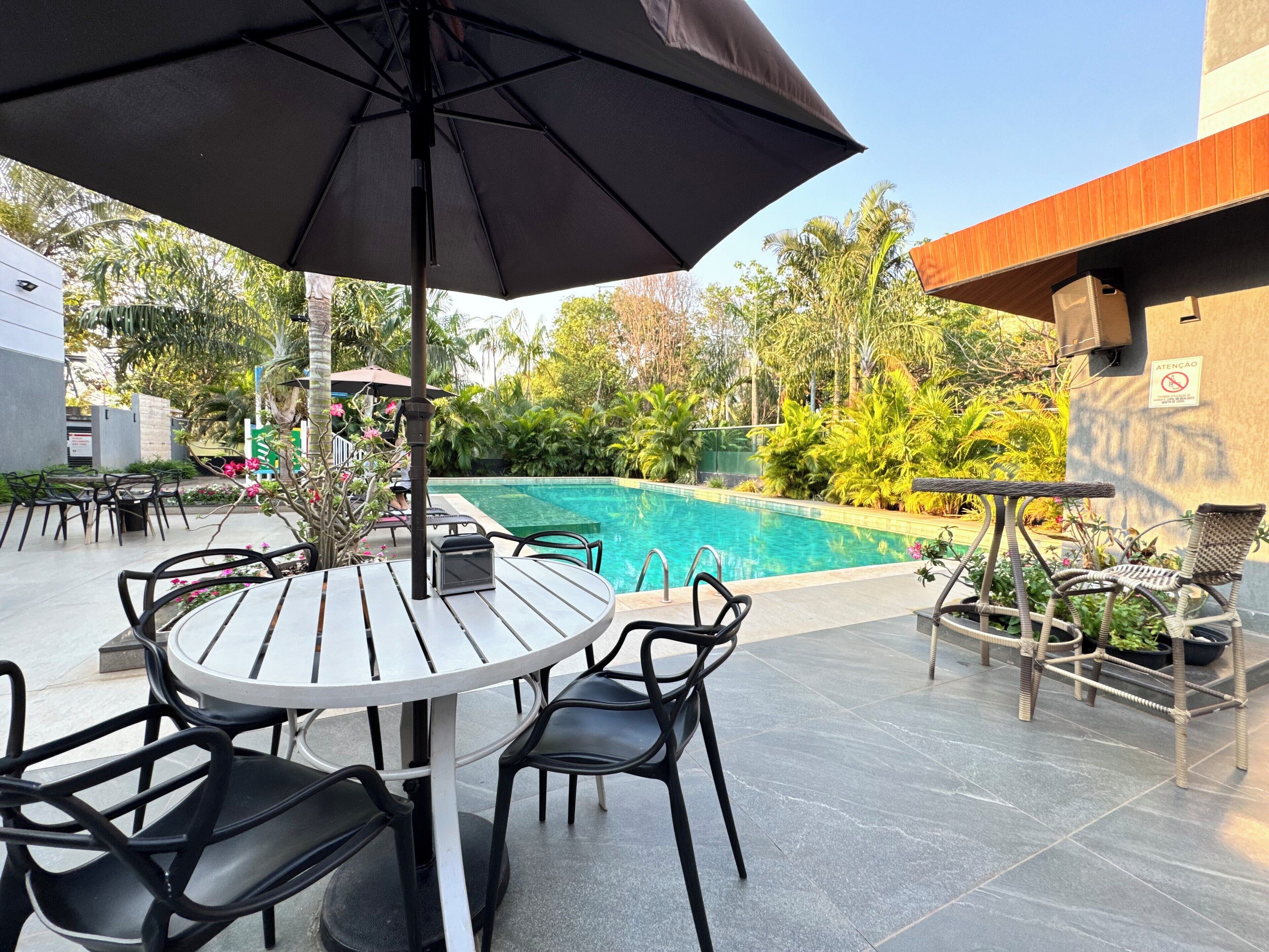 Outdoor pool, open 9:00 AM to 10:00 PM, free pool cabanas, pool loungers